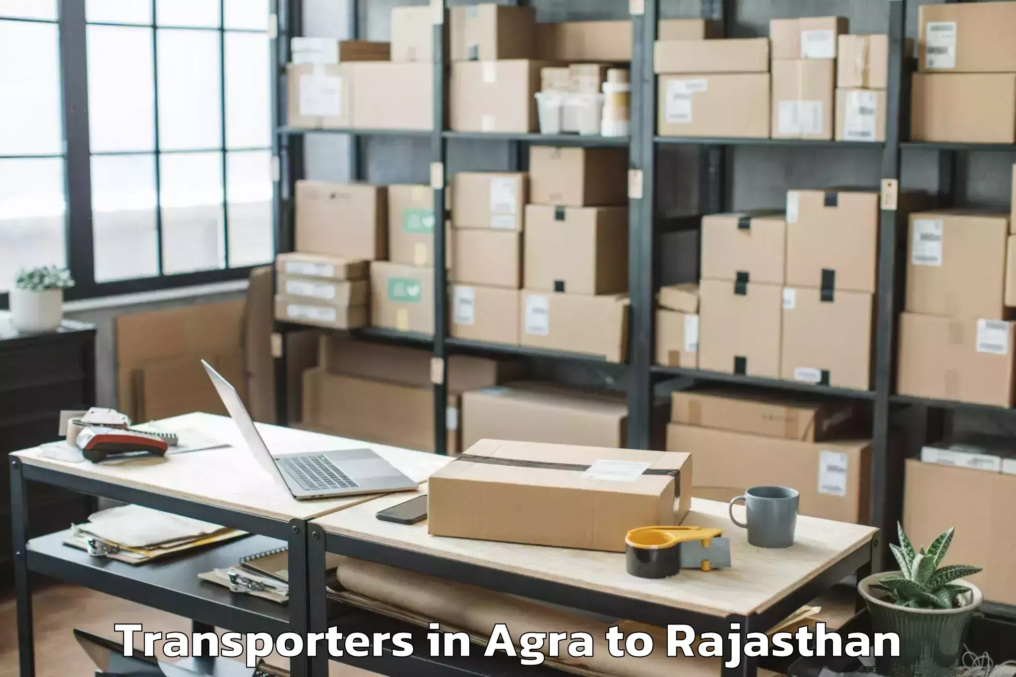 Top Agra to Sagwara Transporters Available